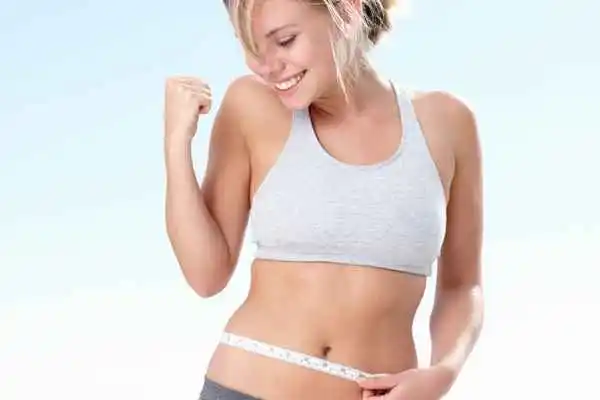 woman happy after fat reduction treatment Biggleswade