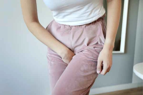woman struggling with urine incontinence Biggleswade