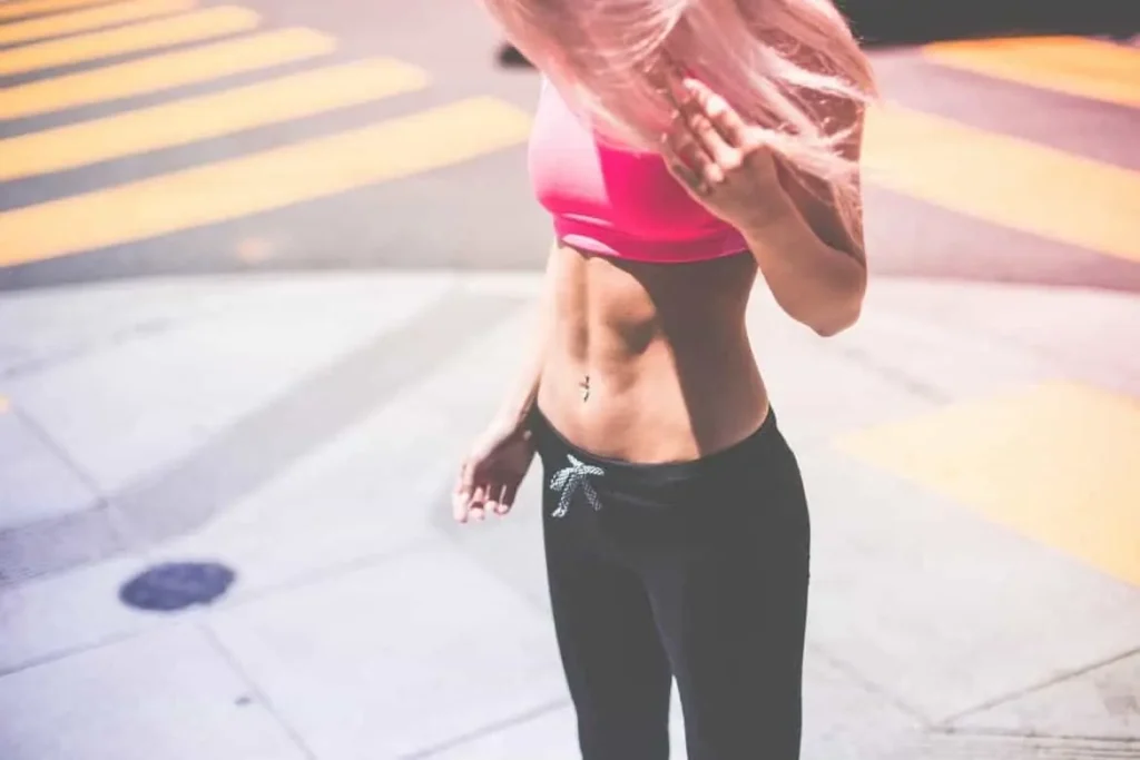 Woman with toned stomach after LA-EMS Body Sculpting Treatment Biggleswade 